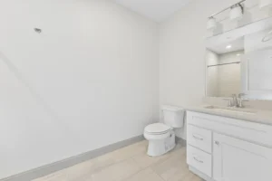 Bathroom with vanity and mirror at 1580 River St #4D