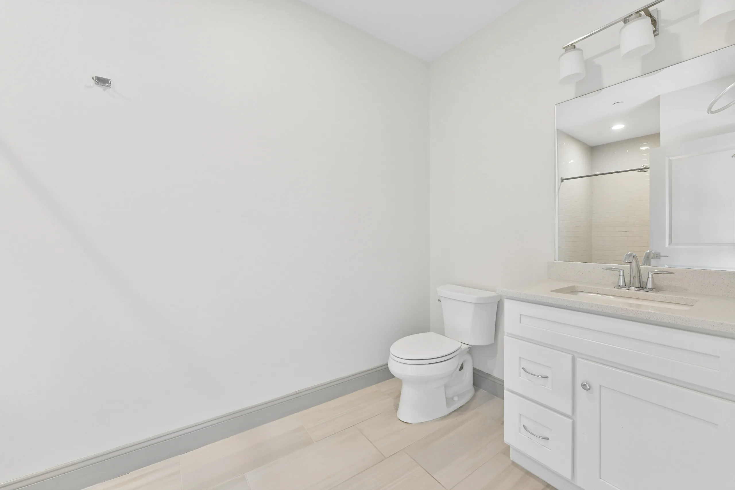 Bathroom with vanity and mirror at 1580 River St #4D