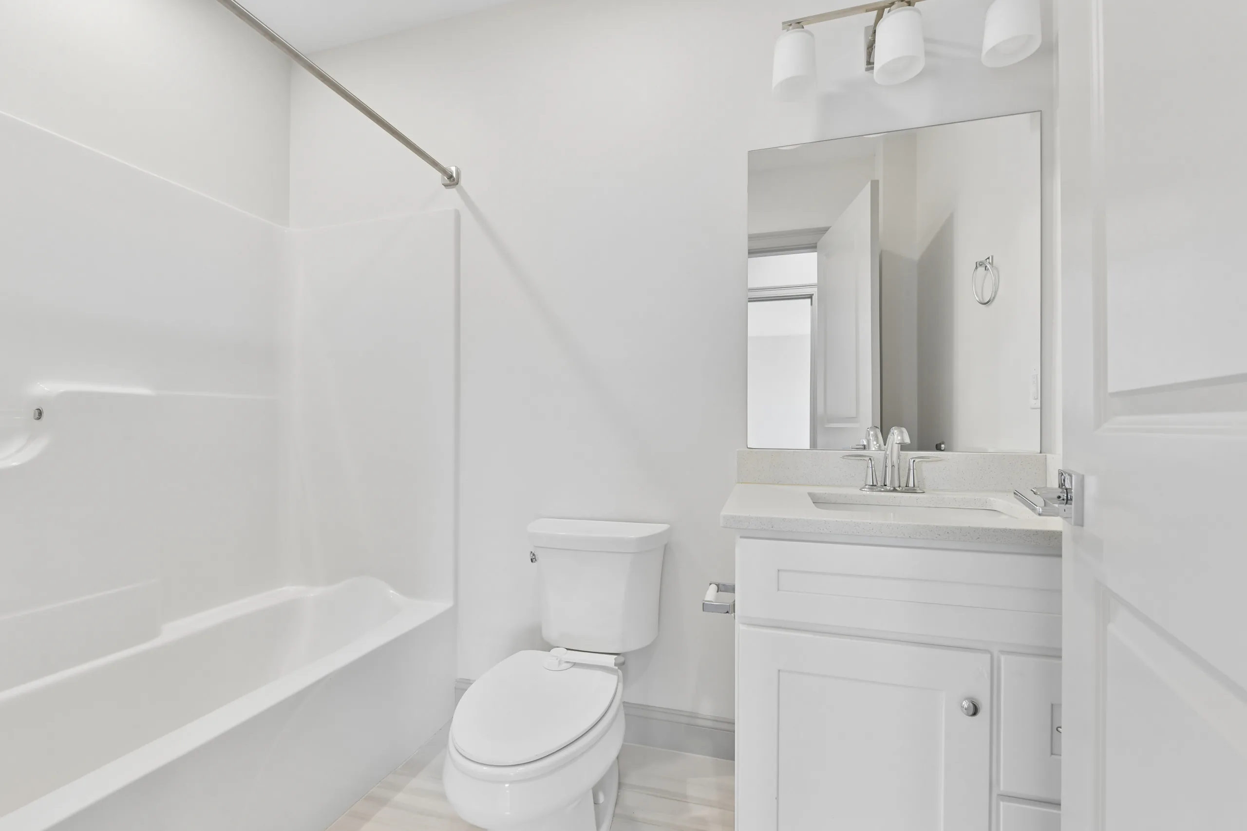Bathroom with bath, shower and vanity at 1580 River St #4D