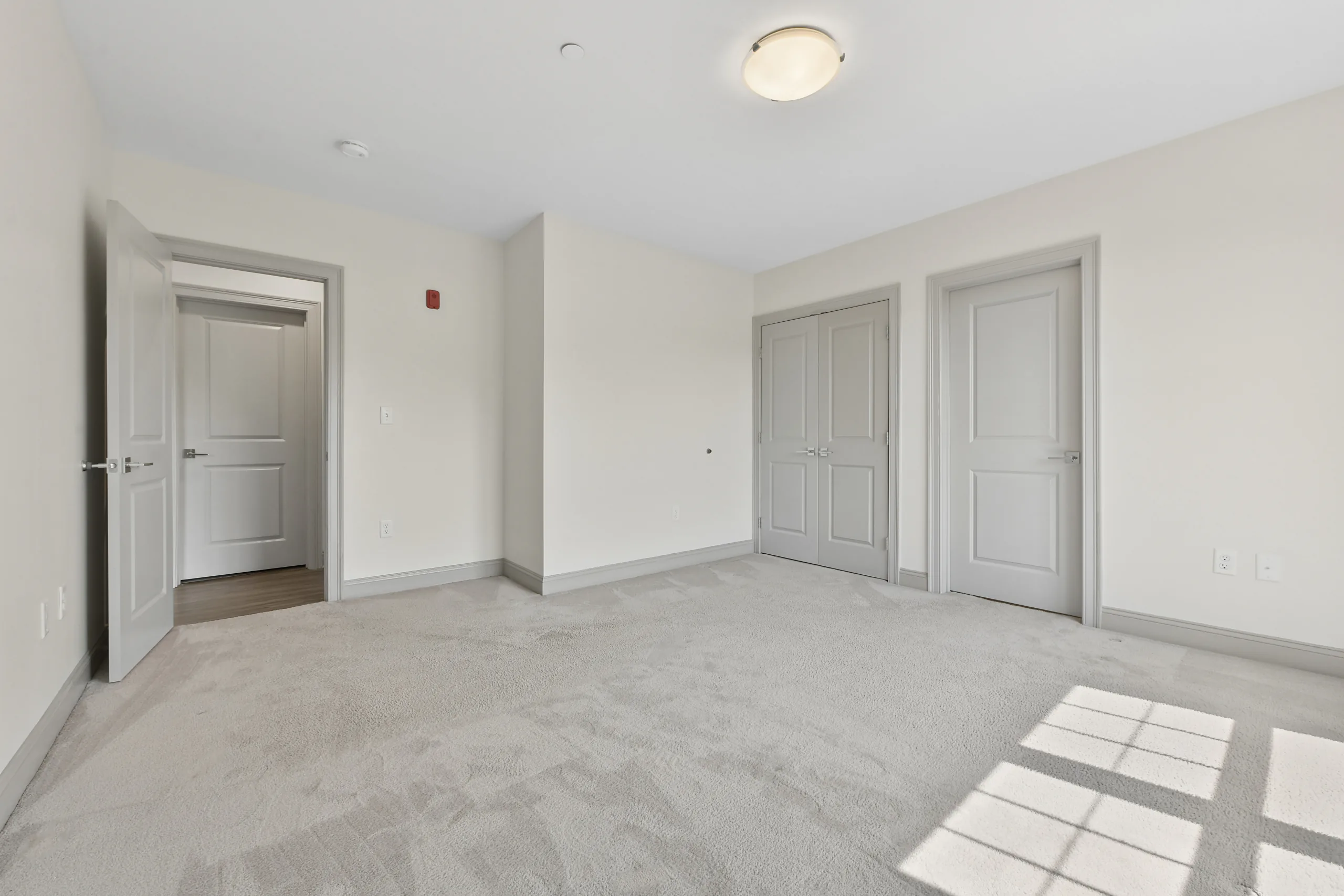 Bedroom with fitted closets at 1580 River St #4D