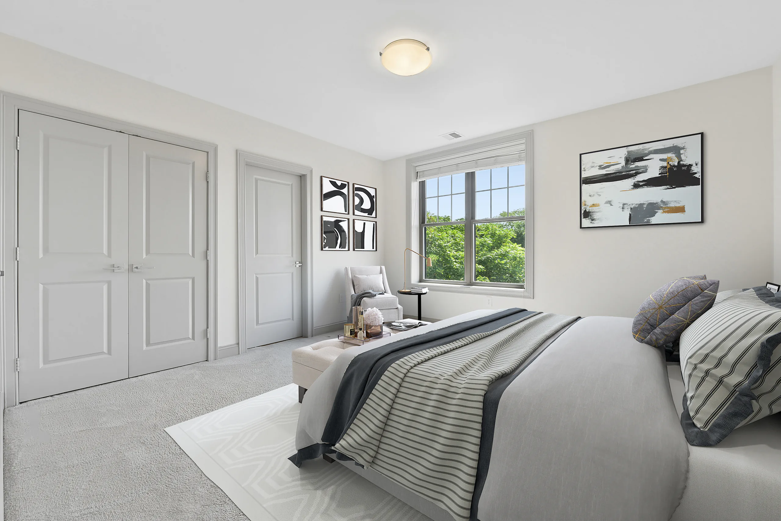 Virtually staged carpeted bedroom with double closets at 1580 River St #4D