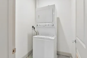 Stacked washer and dryer in-unit at 1580 River St #4D