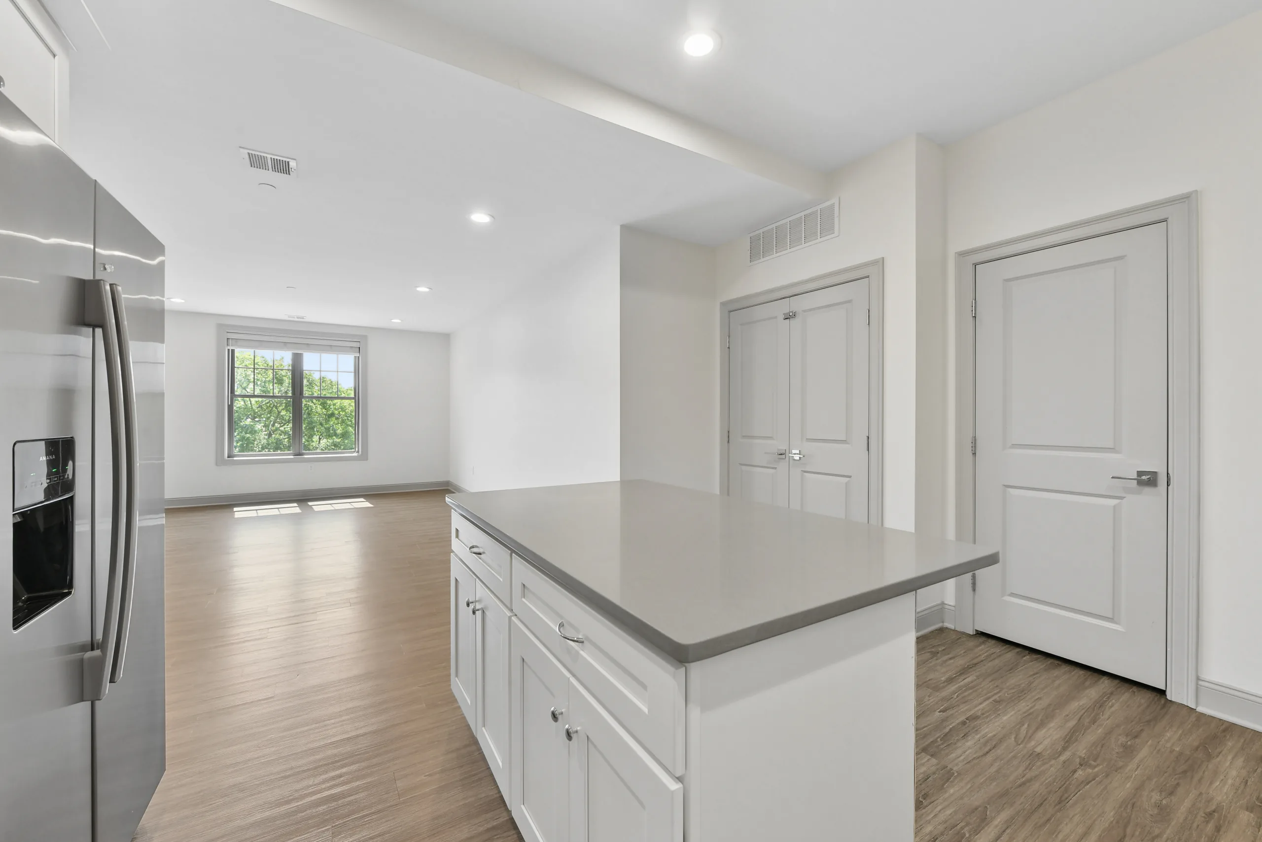 Kitchen island and breakfast bar at 1580 River St #4D