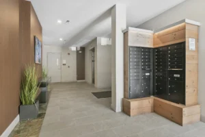 Residents' lobby and mailroom at Thread Hyde Park, 1580 River St